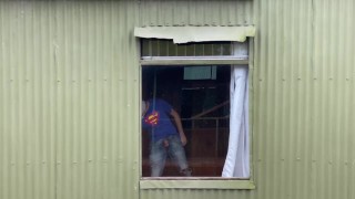 Daring masturbation by the window with cumshot