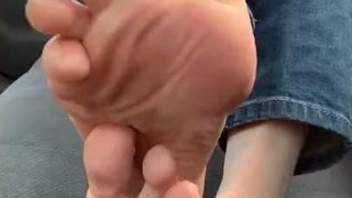 In my car with me and my feet